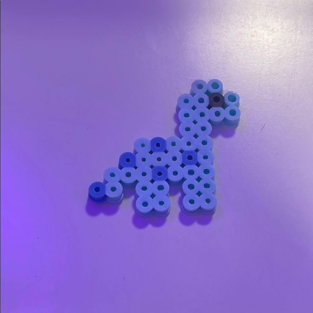 Blue and Black Pixel Art Dog Toy